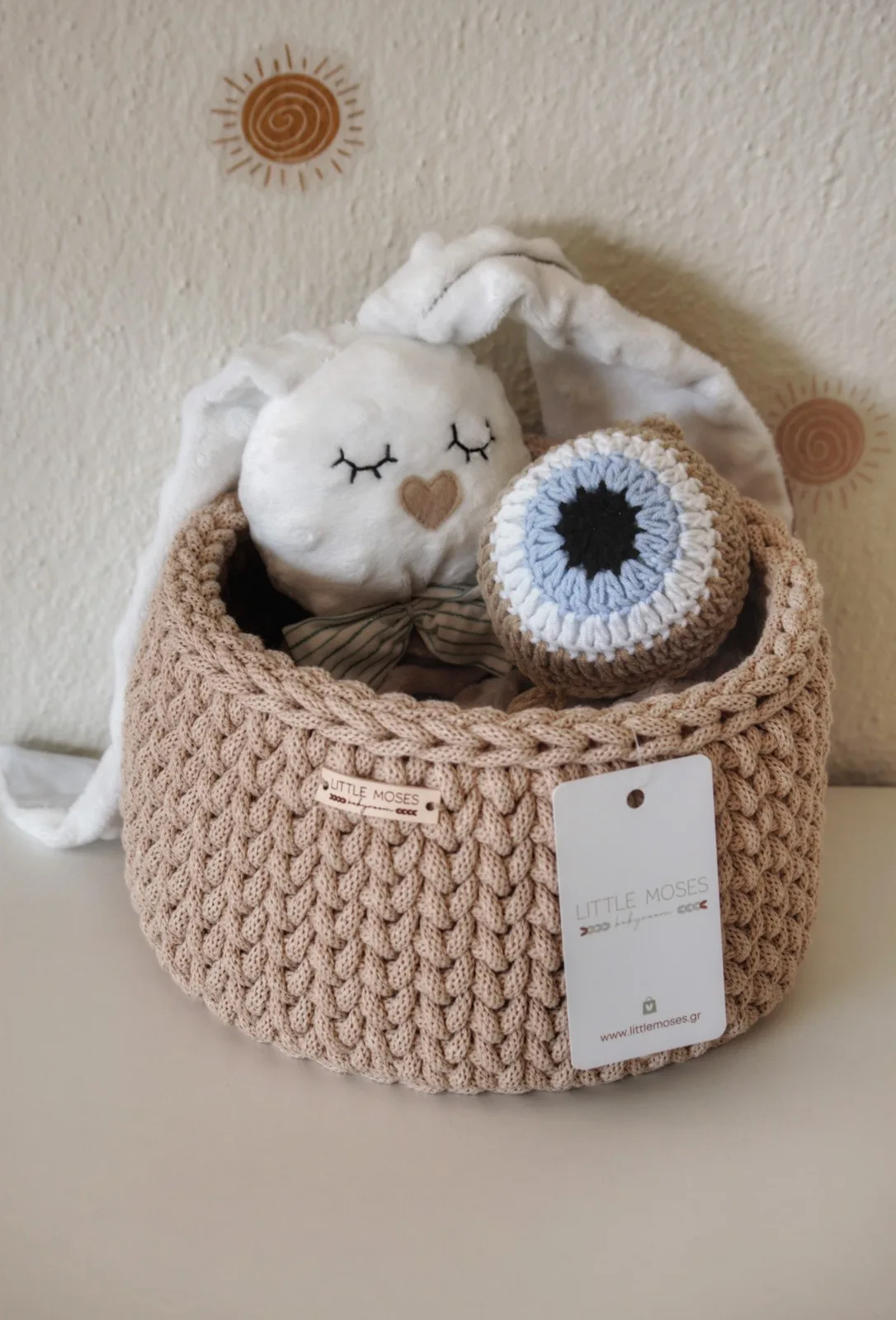 Handmade knitted gift basket with a bunny